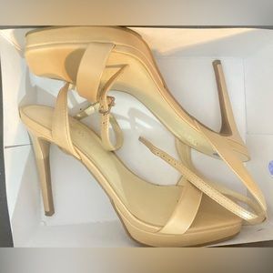 Nude Nine West heel sandals.